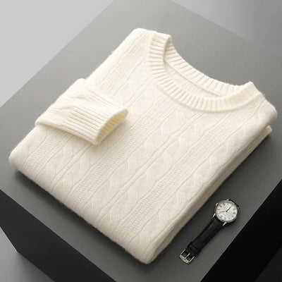 Cable-knit crewneck sweater with ribbed cuffs and hem for a structured finish.