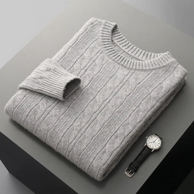 Cable-knit crewneck sweater with ribbed cuffs and hem for a structured finish.