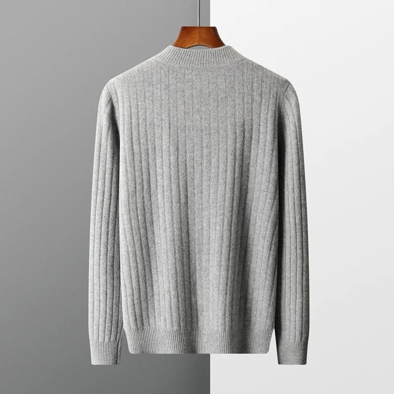 Full-zip ribbed cashmere sweater with mock neck and vertical knit pattern.