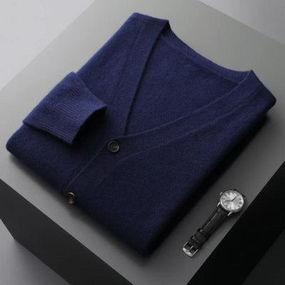 V-neck merino wool cardigan with front button closure and ribbed cuffs.