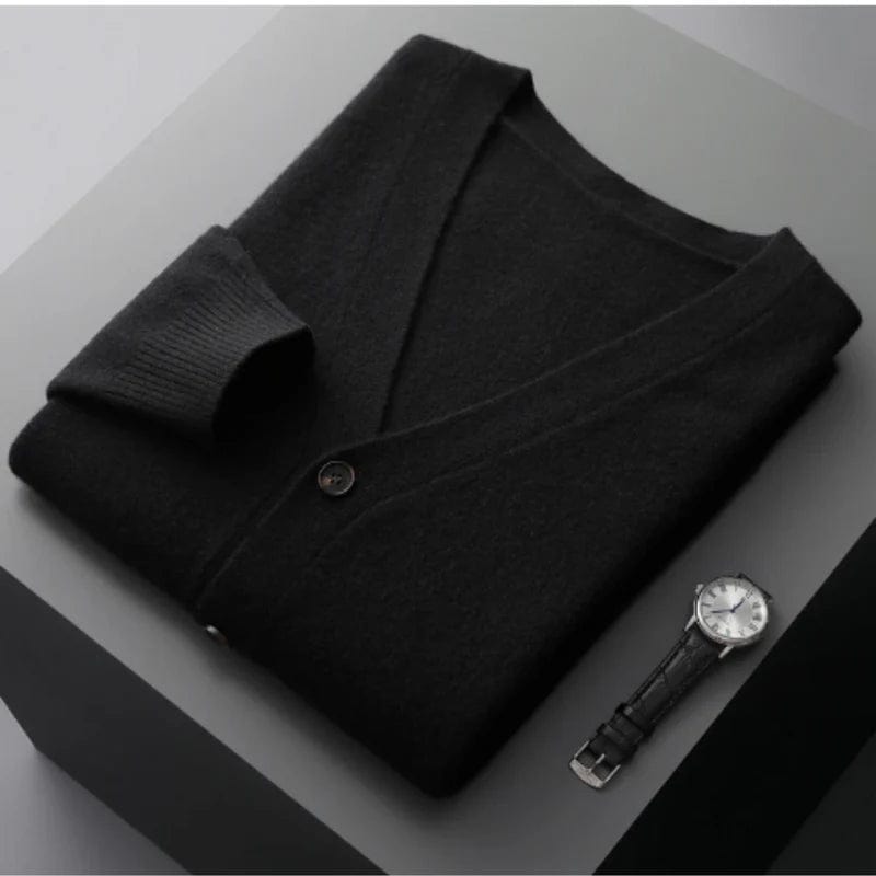 V-neck merino wool cardigan with front button closure and ribbed cuffs.