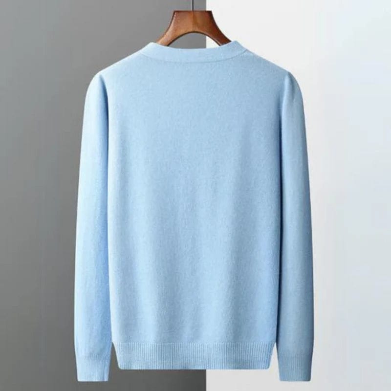 V-neck merino wool cardigan with front button closure and ribbed cuffs.