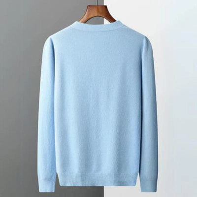 V-neck merino wool cardigan with front button closure and ribbed cuffs.