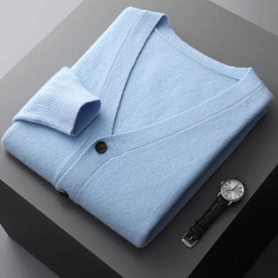 V-neck merino wool cardigan with front button closure and ribbed cuffs.