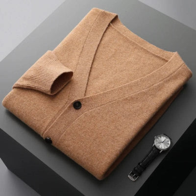 V-neck merino wool cardigan with front button closure and ribbed cuffs.