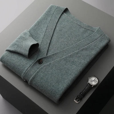 V-neck merino wool cardigan with front button closure and ribbed cuffs.