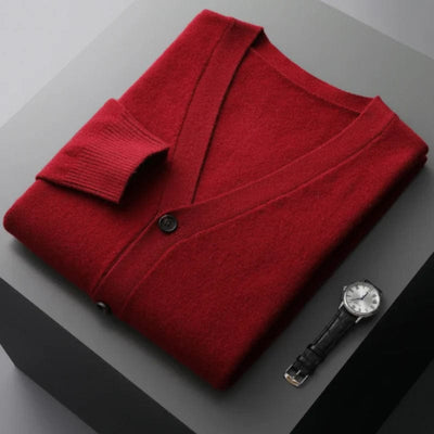 V-neck merino wool cardigan with front button closure and ribbed cuffs.
