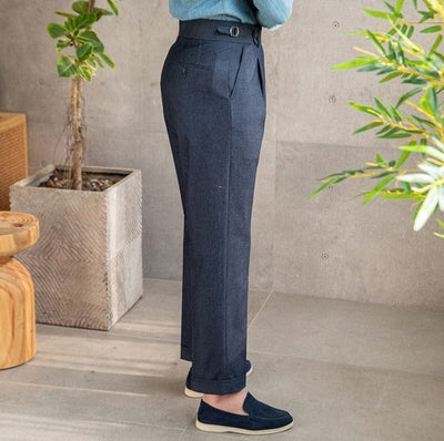 Tailored pleated dress trousers with high waist and cuffed hem