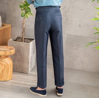 Tailored pleated dress trousers with high waist and cuffed hem