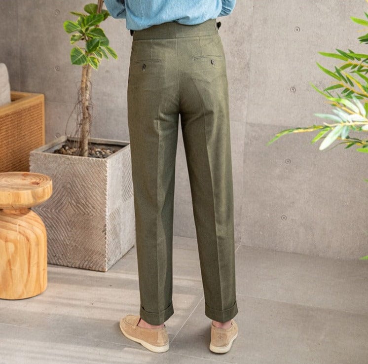 Tailored pleated dress trousers with high waist and cuffed hem