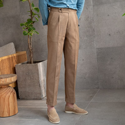 Tailored pleated dress trousers with high waist and cuffed hem