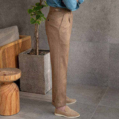 Tailored pleated dress trousers with high waist and cuffed hem