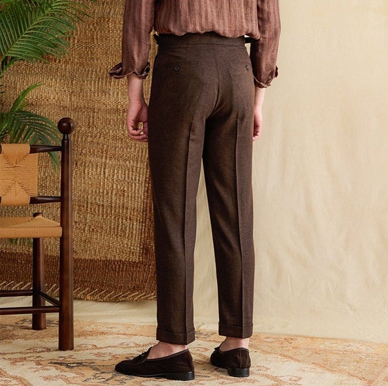 Pleated cuffed trousers with high-rise waistband and tailored structure