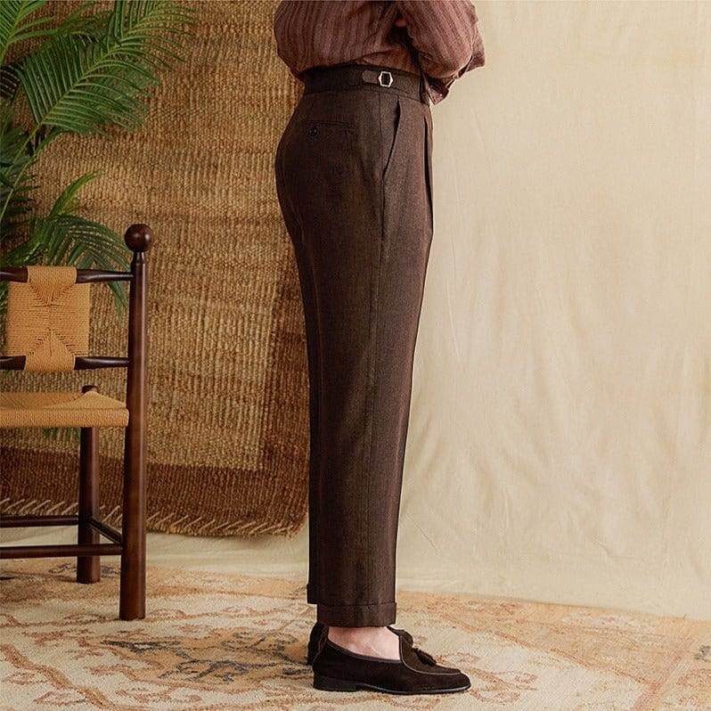 Pleated cuffed trousers with high-rise waistband and tailored structure