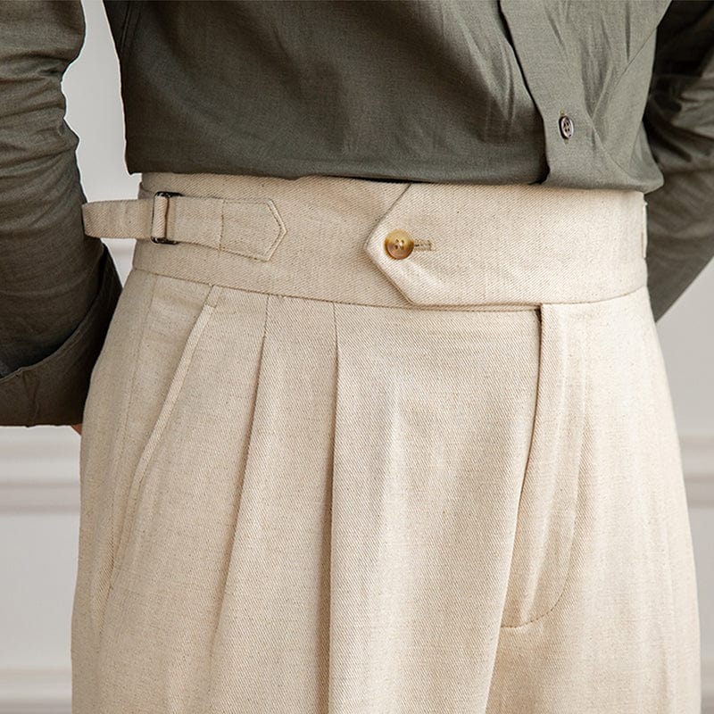 High-waist pleated trousers with tailored cut and button-tab waistband