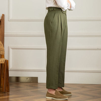 High-waist pleated trousers with tailored cut and button-tab waistband