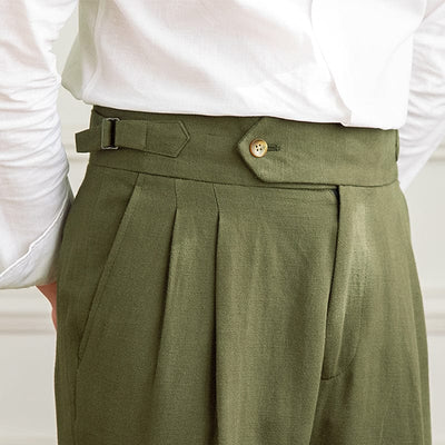 High-waist pleated trousers with tailored cut and button-tab waistband