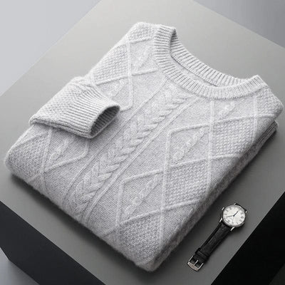 Crewneck cashmere sweater with textured diamond pattern and ribbed cuffs.