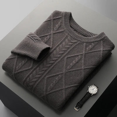Crewneck cashmere sweater with textured diamond pattern and ribbed cuffs.