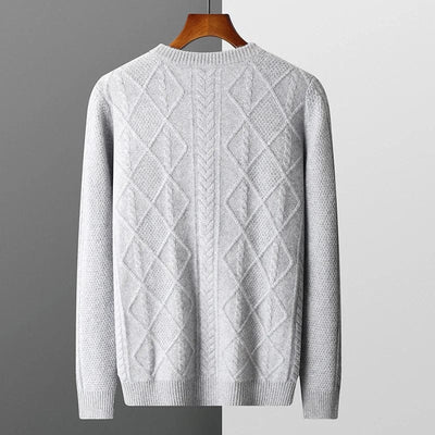 Crewneck cashmere sweater with textured diamond pattern and ribbed cuffs.