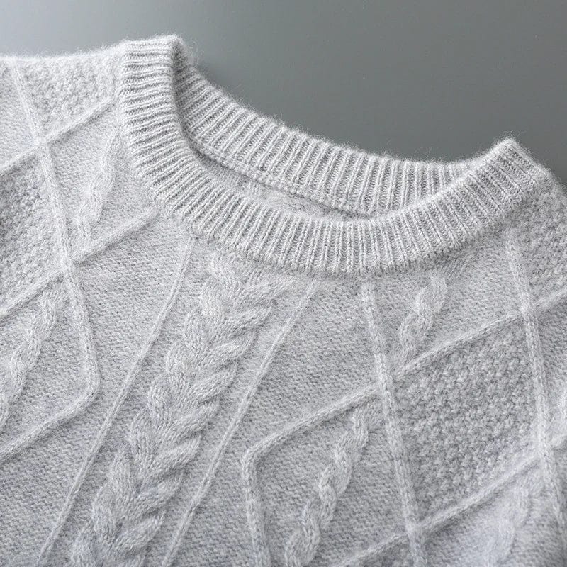 Crewneck cashmere sweater with textured diamond pattern and ribbed cuffs.